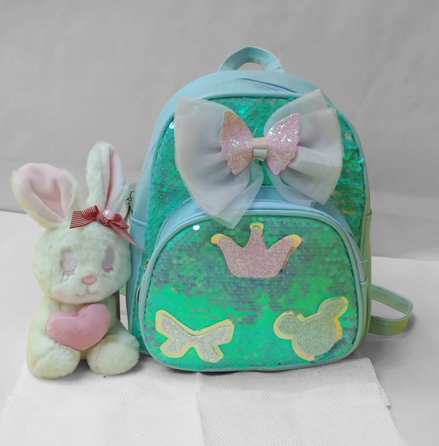 Mini Sequence Bow Backpack.