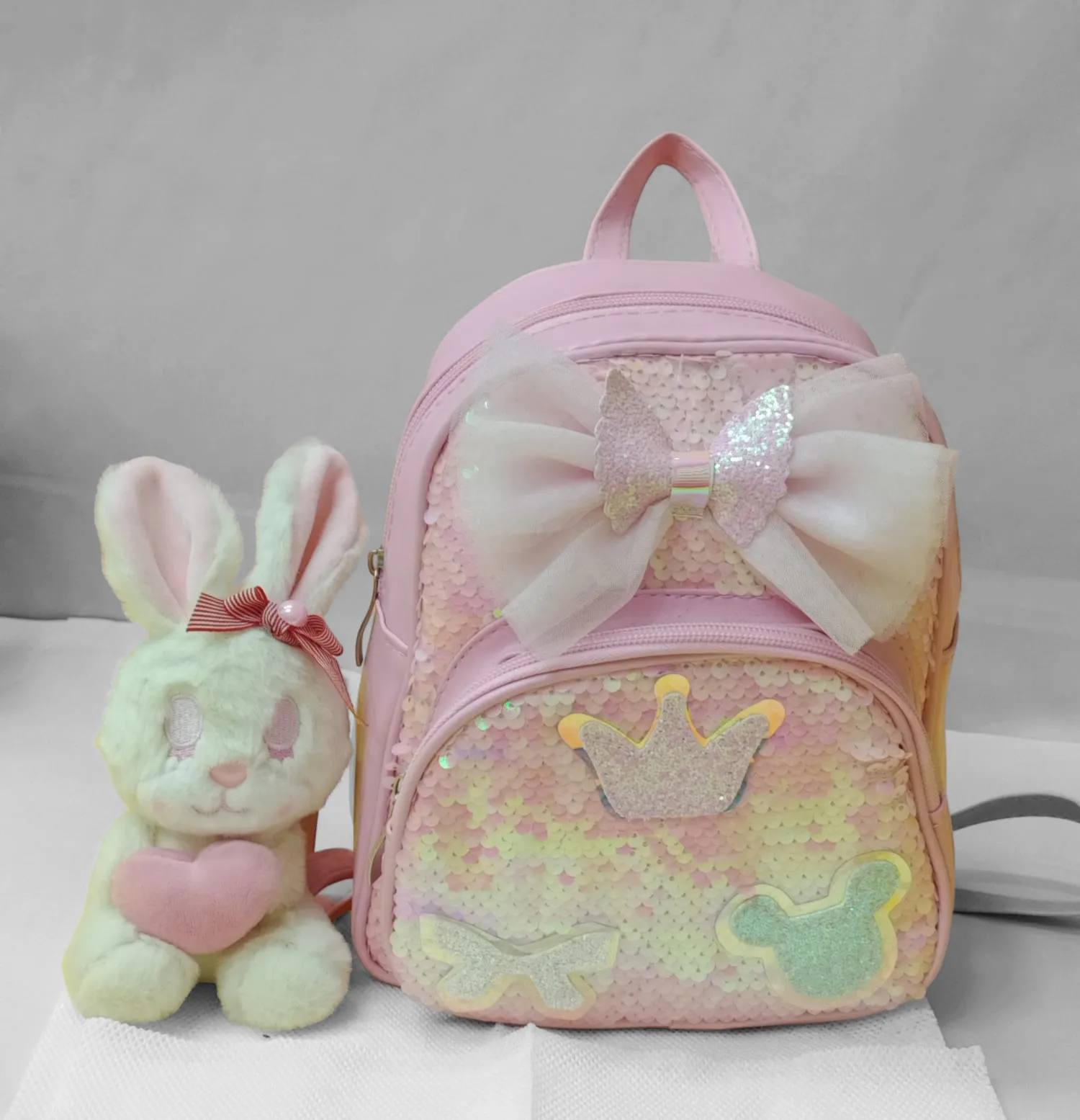 Mini Sequence Bow Backpack.